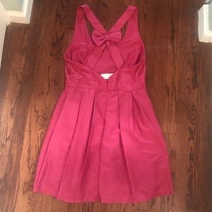 NWT Pink dress with bow and criss cross back strap